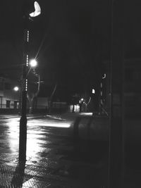 Illuminated street light at night