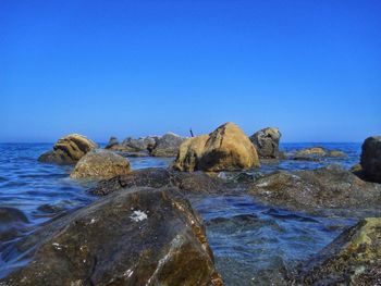 Scenic view of sea against clear sky