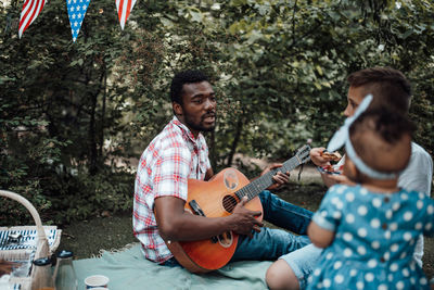 Young man playing guitar