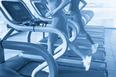 Low section of woman standing in gym
