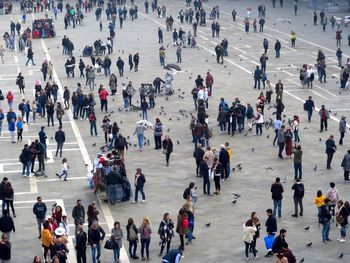 High angle view of people walking on street