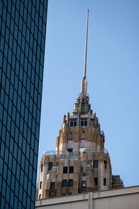 Low angle view of building against blue sky