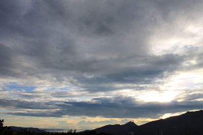 Low angle view of dramatic sky during sunset