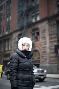 Young woman on street in city