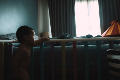 Baby in crib at home