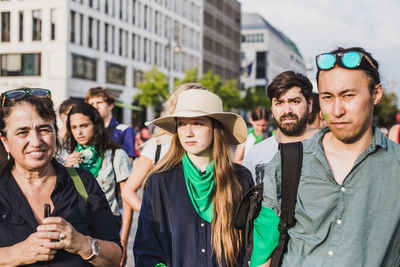 Young couple standing in city