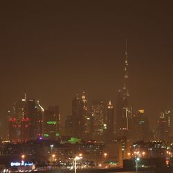 View of city lit up at night