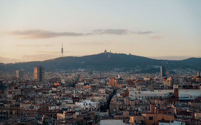 High angle view of city against sky during sunset