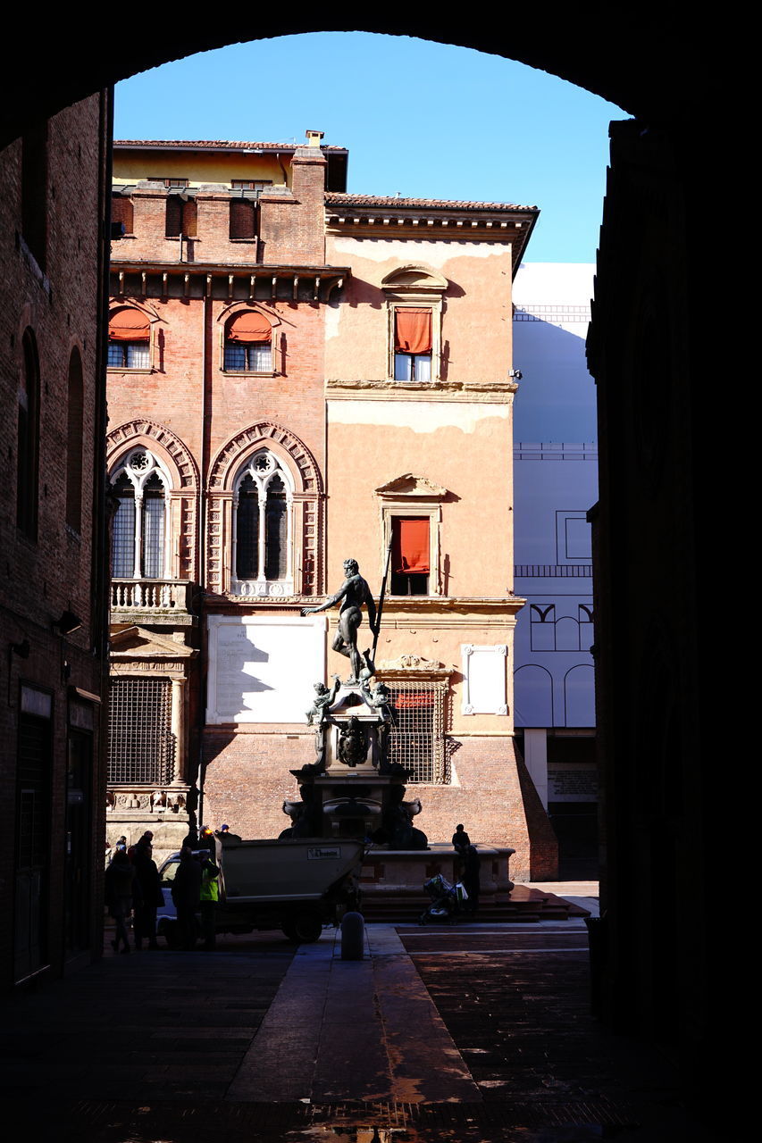 STATUE IN FRONT OF TEMPLE