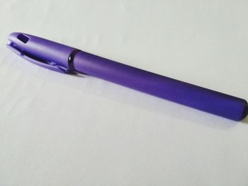 High angle view of pen on table against white background