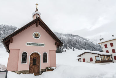 Snow magic. walk in the ancient village of sappada. friuli