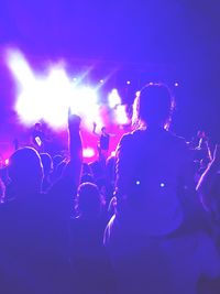 People enjoying at concert