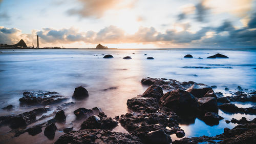 Scenic view of sea against sky during sunset