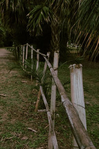 View of wooden fence on field