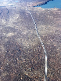 High angle view of road by sea