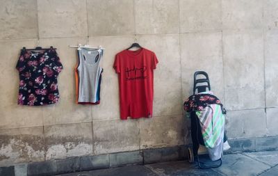 Clothes hanging on wall