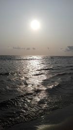 Scenic view of sea against sky at sunset