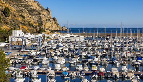 A very busy javea port looking serene and beautiful on another spectacular day in spain.