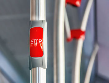 Close-up of stop sign on metal pole