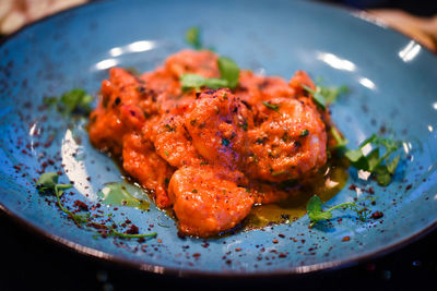 High angle view of meat in plate on table