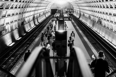 People on railroad station platform
