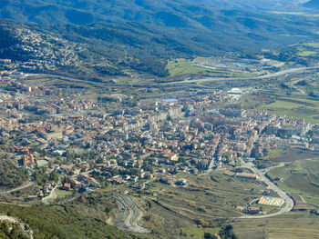 High angle view of illuminated buildings in city