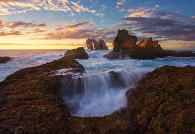 Scenic view of sea against sky during sunset