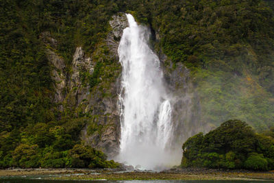 View of waterfall in forest