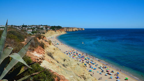 High angle view of beach against clear blue sky