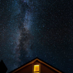 Low angle view of building against sky at night