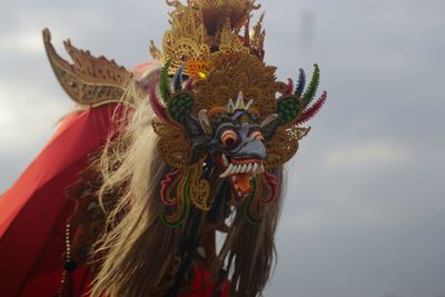 Close-up of multi colored decoration against sky