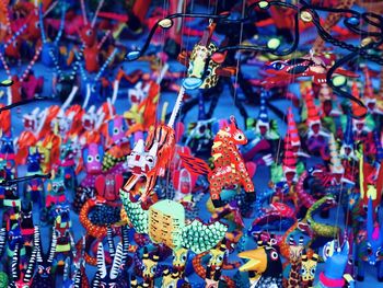 Full frame shot of multi colored decorations hanging in market