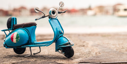 Motor scooter parked on street