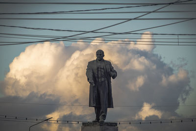 Low angle view of statue against sky during sunset