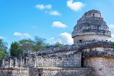 Low angle view of el caracol against sky