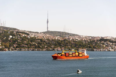 A container filled big tanker passing by bosporus istanbul