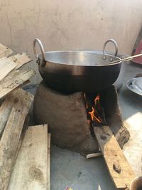 High angle view of fire on barbecue grill