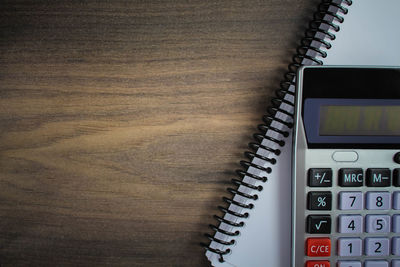 High angle view of telephone on table