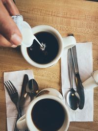 High angle view of coffee cup on table