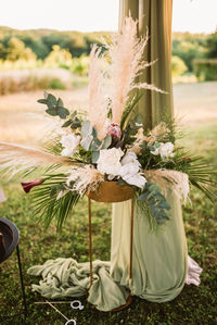 Close-up of flower bouquet on field