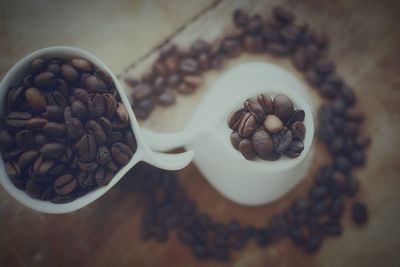 Close-up of coffee beans on table