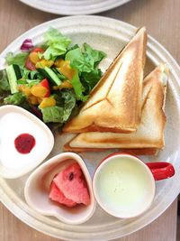 High angle view of breakfast served on table