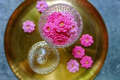 High angle view of pink roses on table