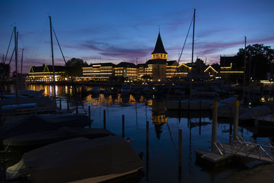 Boats moored at harbor