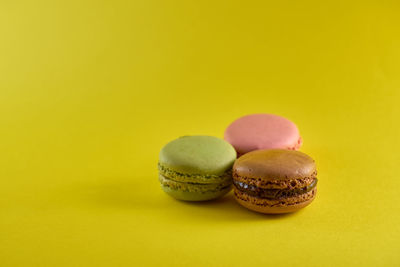 Close-up of cake against yellow background