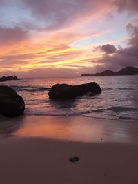 Scenic view of sea against sky during sunset