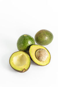 Close-up of fruits against white background