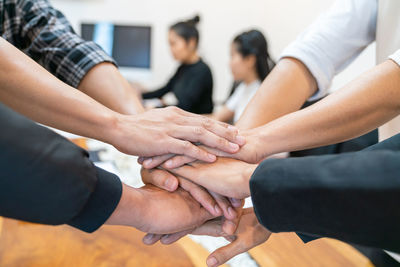 Group of people on hands