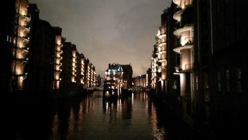 View of canal along buildings