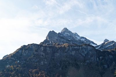 Scenic view of rocky mountains against sky